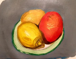 Paining of an orange and two lemons on a plate in acrylic paints on canvas paper.